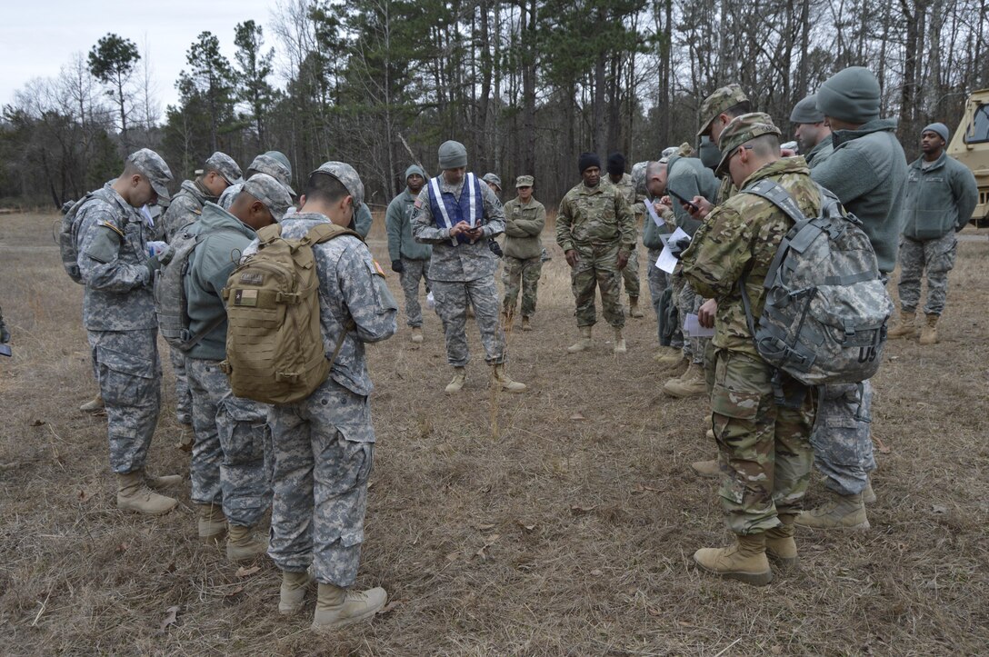 Participants in the 4th ESC Best Warrior Competition prepare for a land navigation evaluation.  The 4th ESC held its 2017 Best Warrior Competition at Camp Parks, AR, Feb. 3-5, 2017.  (U.S. Army Reserve photo by Army Master Sgt. Dave Thompson)