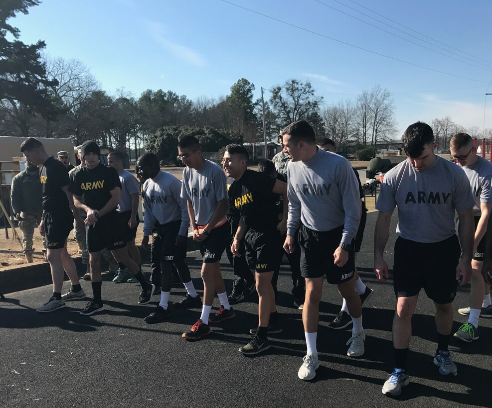 Participants in the 4th ESC Best Warrior Competition prepare for the run portion of the Army Physical Fitness Test.  The 4th ESC held its 2017 Best Warrior Competition at Camp Parks, AR, Feb. 3-5, 2017.  (U.S. Army Reserve photo by Army Master Sgt. Dave Thompson)