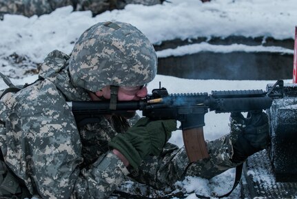 Sgt. Robert M. Hughes, 476th Chemical Battalion, engages a target at the M4 qualification portion of the 301st Maneuver Enhancement Brigade Best Warrior competition, at Joint Base Lewis-McChord, Washington, February 7, 2017. Best Warrior is an annual competition designed to test each soldier’s physical and mental fitness, proficiency in warrior tasks, resiliency, and their determination to be the best (U.S. Army Reserve Photo by Spc. Sean Harding/Released).