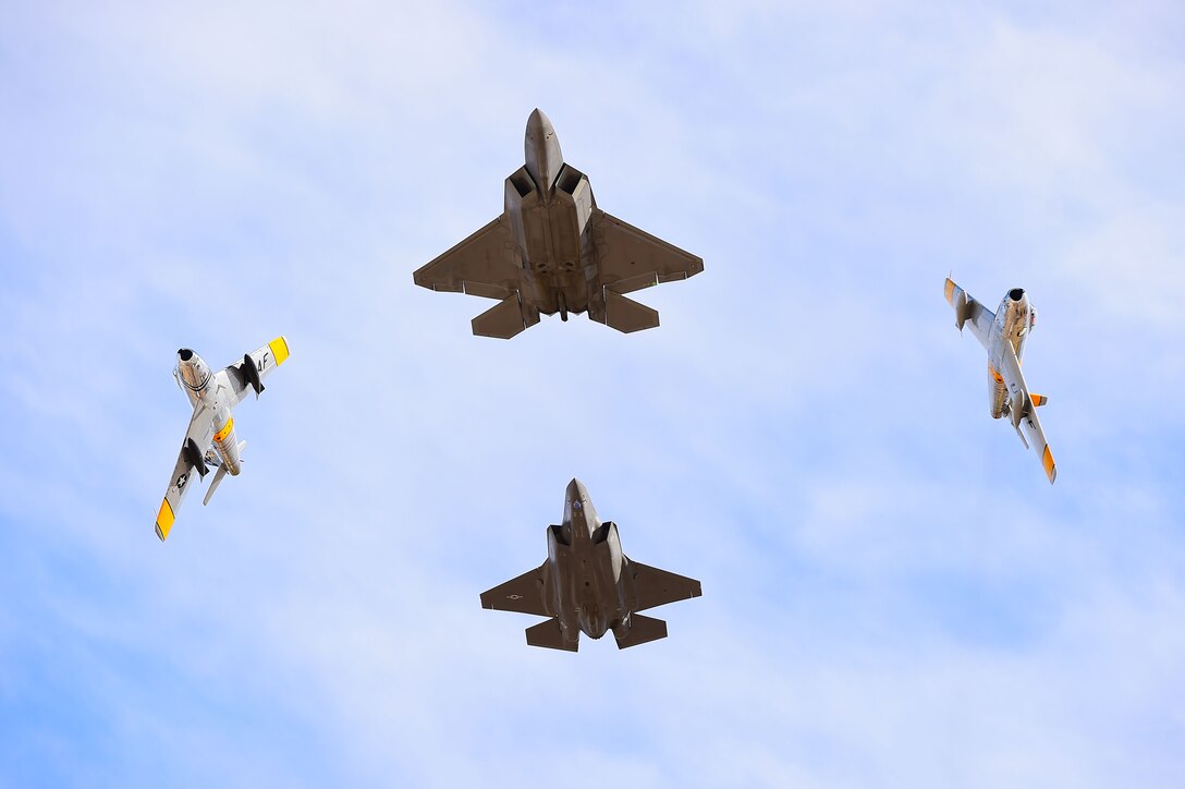 An F-22 Raptor leads a formation during the 2017 Heritage Flight Training and Certification Course at Davis-Monthan Air Force Base, Ariz., Feb 12, 2017. The Heritage Flight course celebrated its 20th active year providing the opportunity for civilian pilots to fly with U.S. Air Force pilots, to prepare them for this year’s upcoming air shows. (U.S. Air Force photo by Senior Airman Kimberly Nagle) 