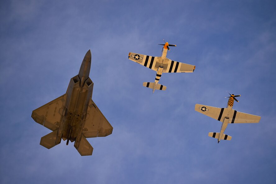 An F-22 Raptor performs a Heritage Flight during the 2017 Heritage Flight Training and Certification Course at Davis-Monthan Air Force Base, Ariz., Feb. 9, 2017. The program was established in 1997, allowing certified civilian pilots and U.S. Air Force pilots to perform flights together. (U.S. Air Force photo by Senior Airman Kimberly Nagle)