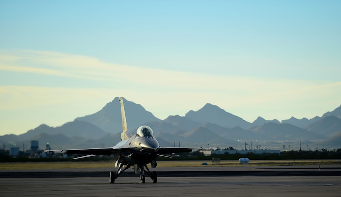 An F-16 Viper taxies after flying during the 2017 Heritage Flight Training and Certification Course at Davis-Monthan Air Force Base, Ariz., Feb. 11, 2017. The F-16 Viper was joined by several aircraft, including the F-22 Raptor, F-35 Lightning II and the A-10C Thunderbolt II during the 20th annual demonstration training. (U.S. Air Force Photo by Senior Airman Kimberly Nagle)  