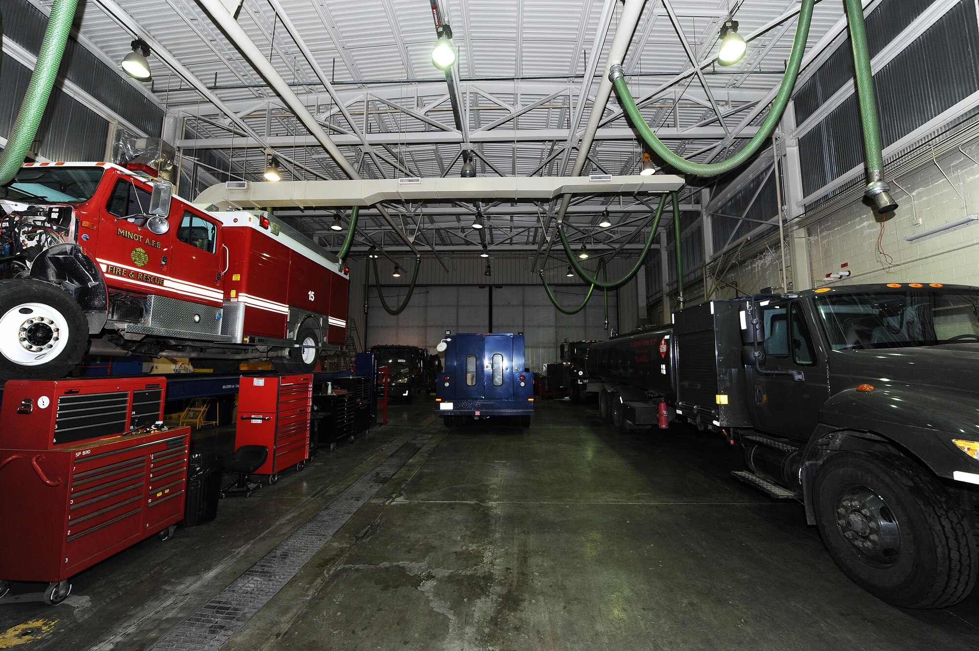 Vehicles sit in a bay waiting for repairs at Minot Air Force Base, N.D., Feb. 8, 2017. The 5th LRS team determines serviceability, overall condition of the trucks, and need for repaid by diagnostic, visual and audio examinations. (U.S. Air Force photo/Senior Airman Kristoffer Kaubisch)