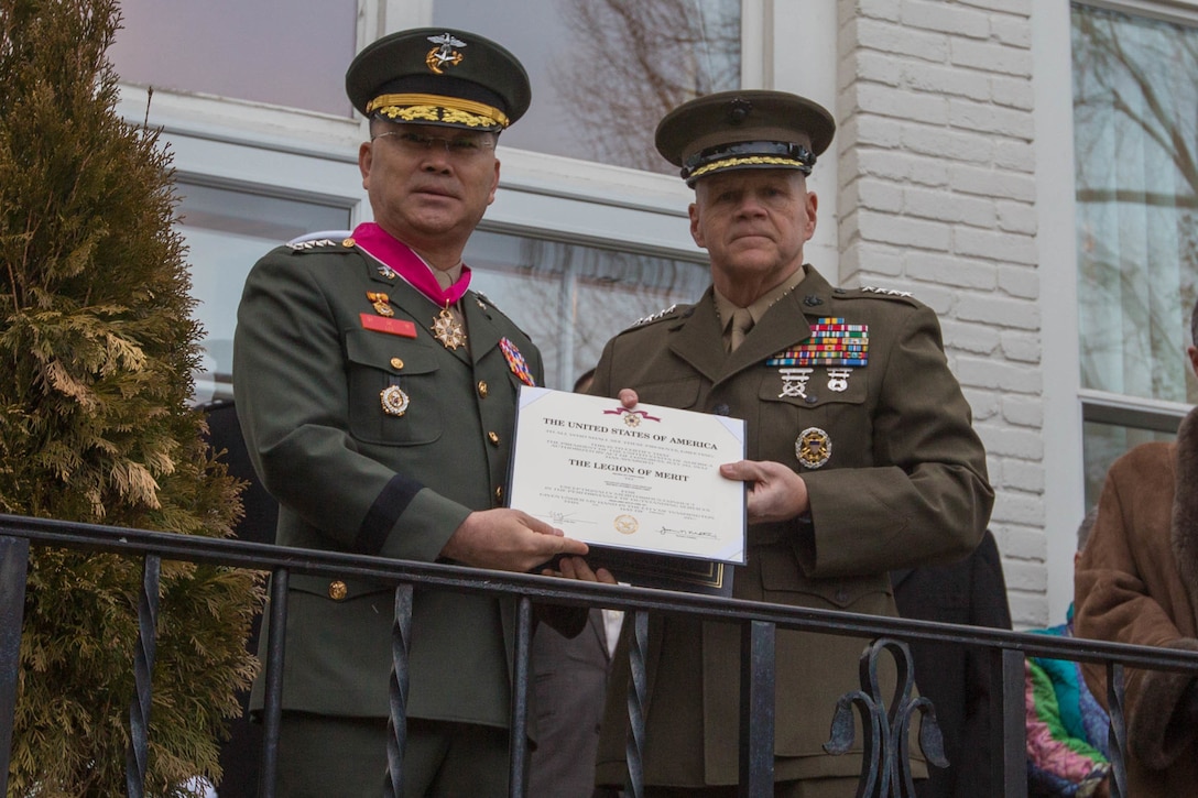 Commandant of the Marine Corps Gen. Robert B. Neller, right, and  Lt. Gen. Lee Sang-Hoon, commandant of the Republic of Korea Marine Corps, pose for a photo during an honors ceremony at the Home of the Commandants, Washington, D.C., Feb. 9, 2017. Neller hosted Sang-Hoon for an honors ceremony and dinner.
