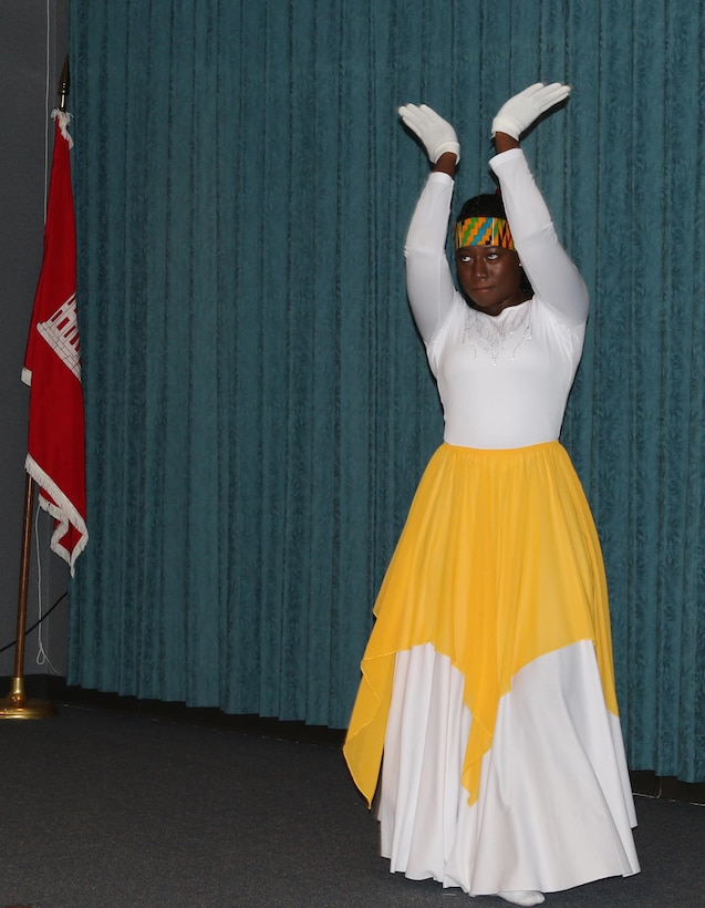 Josephine-Joy Hammond dances during the African American Heritage program at the Tulsa District office, Feb. 15. Hammond, who is a native of Ghana, a nation located in West Africa, performs and teaches praise and contemporary interpretive dance at her church.