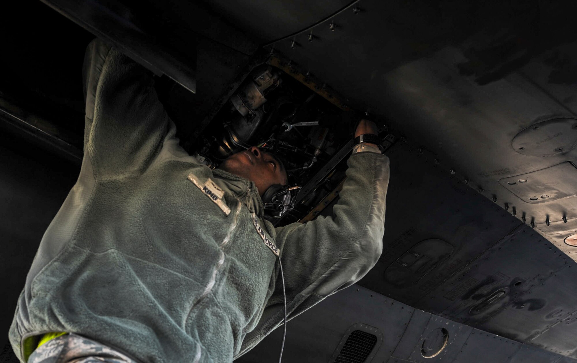 Airman 1st Class Jaylin King an aerospace propulsion apprentice assigned to the 28th Aircraft Maintenance Squadron, Ellsworth Air Force Base, S.D., works on a B-1B Lancer during Red Flag 17-1 on Nellis Air Force Base, Nev., Jan. 27, 2017. Aerospace Propulsion specialists test, maintain and repair all parts of the engine in order to keep the B-1b flying during the three week exercise. (U.S. Air Force photo by Airman 1st Class Kevin Tanenbaum/Released) 