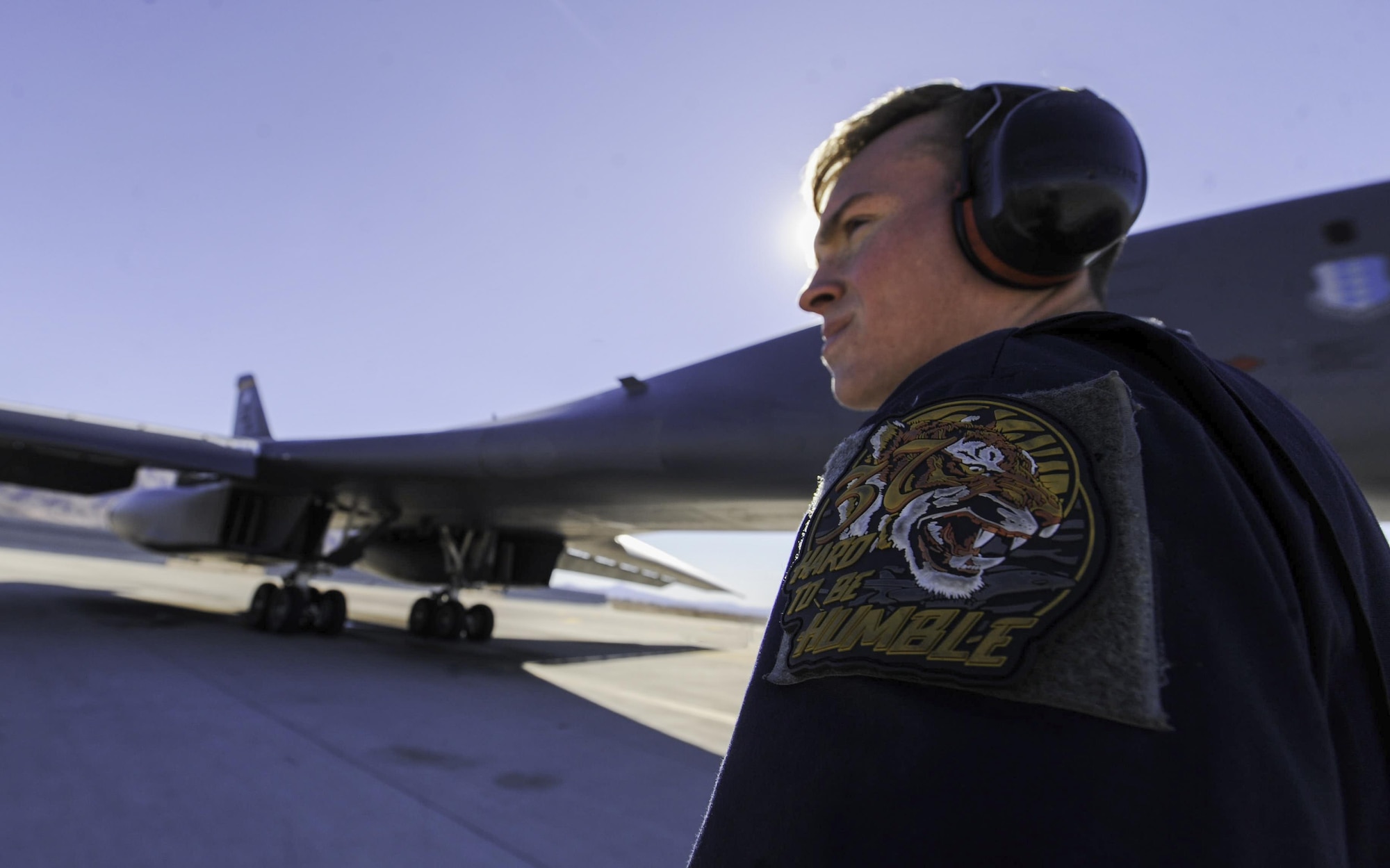 Senior Airman Jacob Widtmannheiser, a crew chief assigned to the 28th Aircraft Maintenance Squadron, Ellsworth Air Force Base, S.D., prepares a B-1B Lancer for take-off during Red Flag 17-1 on Nellis Air Force Base, Nev., Jan. 27, 2017. Red Flag is one of a series of advanced training programs administered by the U.S. Air Force Warfare Center to train aircrews. (U.S. Air Force photo by Airman 1st Class Kevin Tanenbaum/Released)