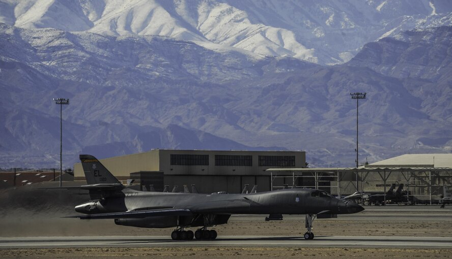 A B-1B Lancer assigned to the 34th Bomb Squadron, Ellsworth Air Force Base, S.D., begins to take off down the runway during Red Flag 17-1 on Nellis Air Force Base, Nev., Jan. 27, 2017. Red Flag involves a variety of attack, fighter, bomber, reconnaissance, electronic warfare, airlift support, and search and rescue aircraft. (U.S. Air Force photo by Airman 1st Class Kevin Tanenbaum/Released)