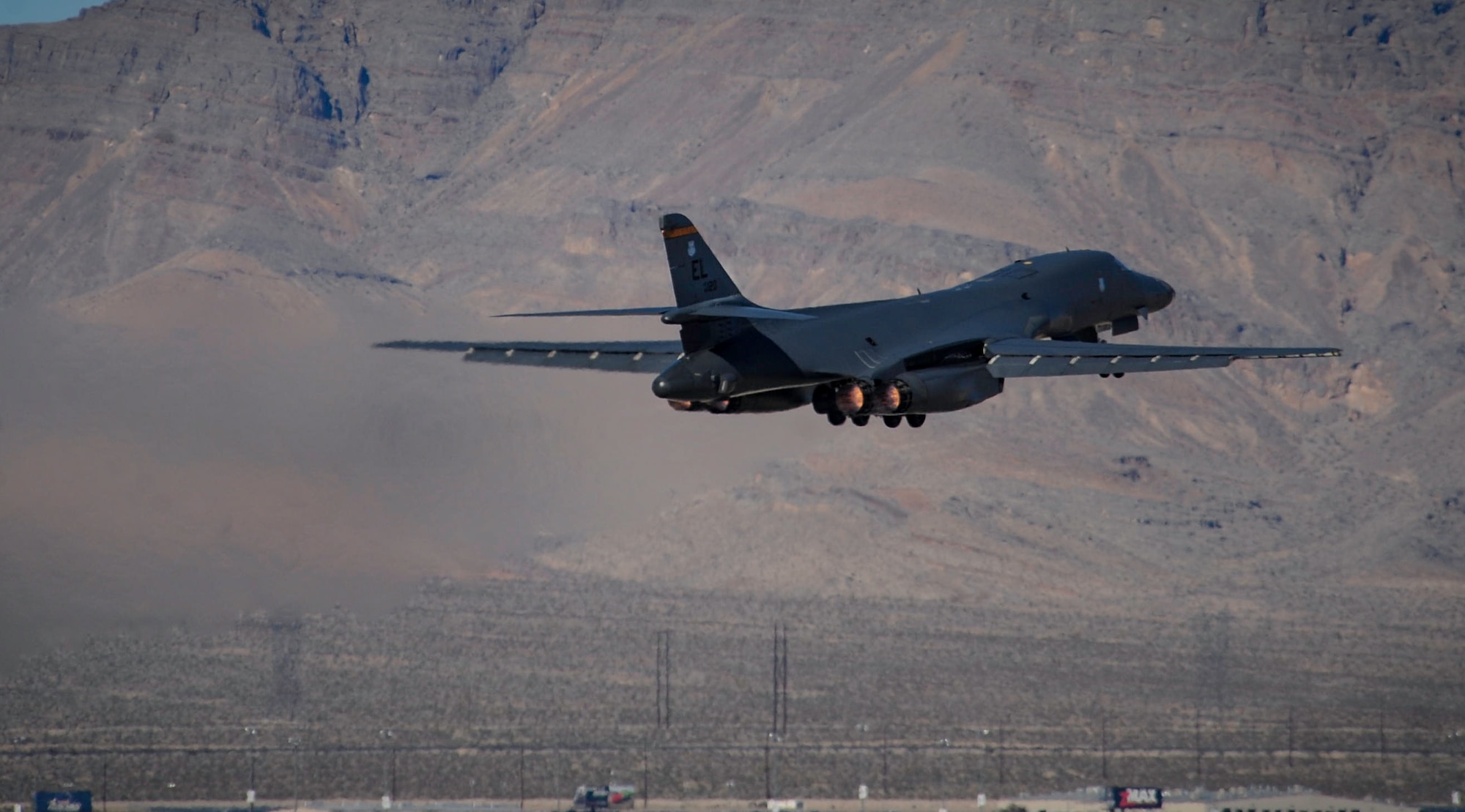 A B-1B Lancer assigned to the 34th Bomb Squadron, Ellsworth Air Force Base, S.D., takes off during Red Flag 17-1 on Nellis Air Force Base, Nev., Jan 27, 2017.  Red Flag is an exercise at Nellis AFB that provides aircrews an opportunity to experience realistic, stressful combat situations in a controlled environment to increase mission capability. (U.S. Air Force photo by Airman 1st Class Kevin Tanenbaum/Released)