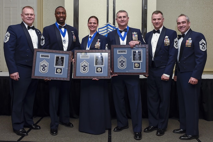 Joint Base Charleston’s newest chief master sergeants are congratulated by retired Chief Master Sgt. James Roy, left, 16th Chief Master Sergeant of the Air Force, during the chief master sergeant recognition ceremony at the Charleston Club Feb. 11, 2017. Chief master sergeant is the highest enlisted rank in the Air Force held by one percent of the enlisted force.  