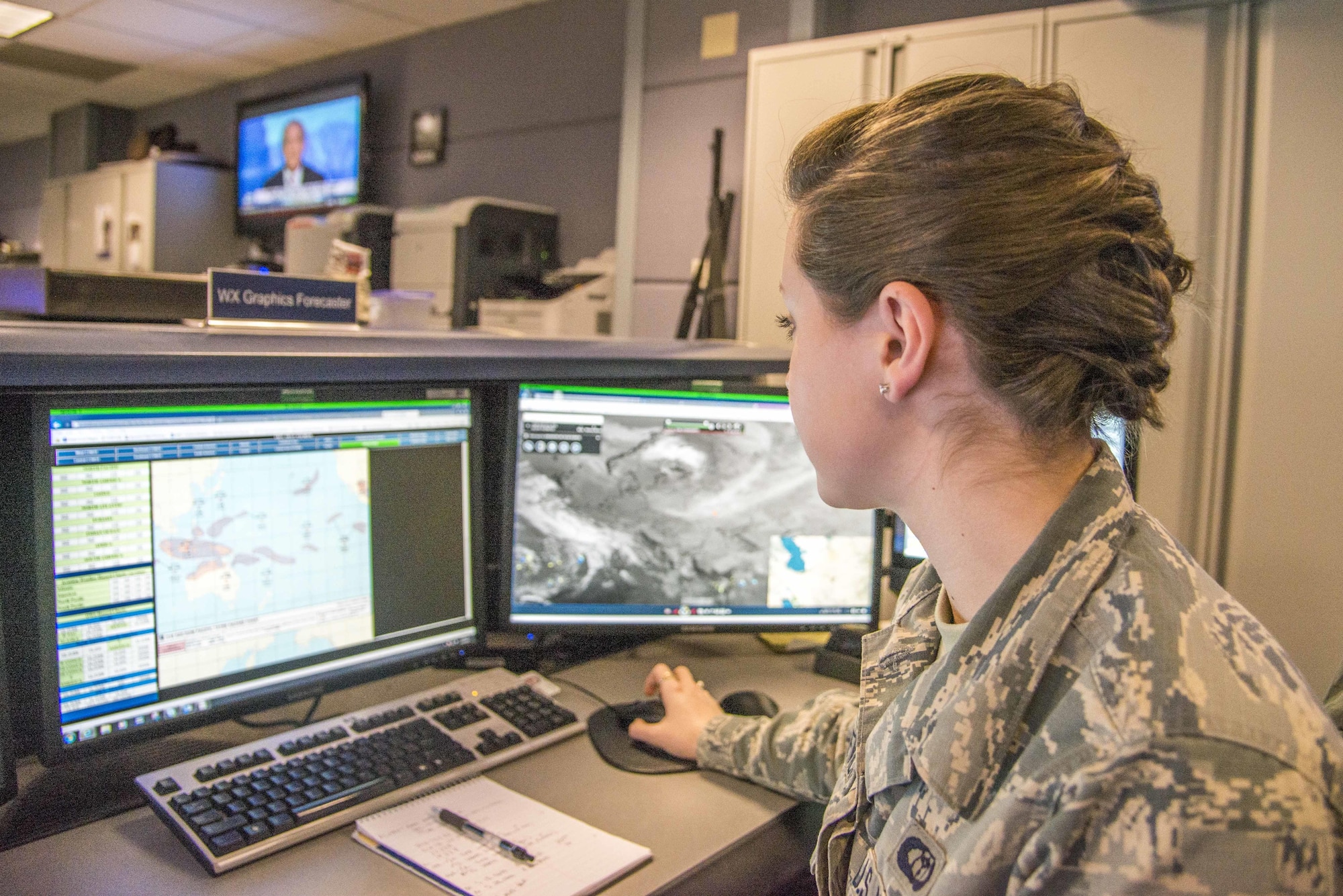 Airman First Class Bryn Franicevich, 618th Air Operations Center global mobility weather apprentice, monitors and compiles climatological data from five operational weather squadrons in support of the 618th AOC mission of commanding and controlling global air mobility operations. The 618th AOC/weather directorate has approximately 40 personnel that are dedicated to making this mission a success. (U.S. Air Force Photo by Airman 1st Class Daniel Garcia)