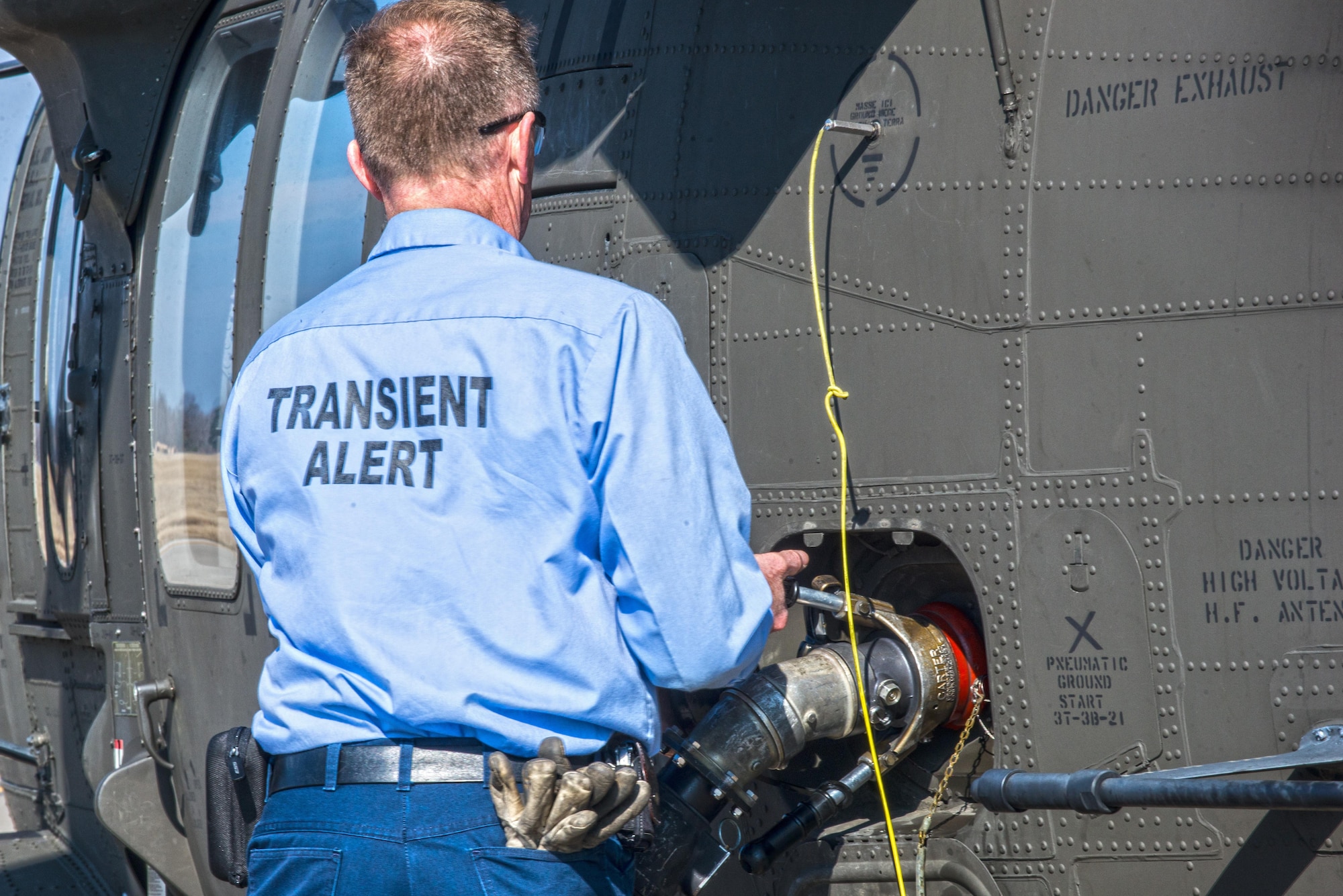 Scott Air Force Base Airmen recently received training for "hot refueling". The training provides aircrews with procedures specific to "hot refueling" operations, with the helicopter running while refueling, versus "cold refueling" where the helicopter is completely shut down prior to receiving fuel. With this two-person operation, one would concentrate on the fueling portion, such as connecting the bonding cable, deploying the fueling hose, and controlling the fueling while the other would remain in eye sight of both the refueler and a flight crew members. Having the choice to "hot refuel" adds to the readiness of the day to day operations and is highly helpful for practice down range when there's not enough time to shut down to refuel. (U.S. Air Force photos/Senior Airman Tristin English)