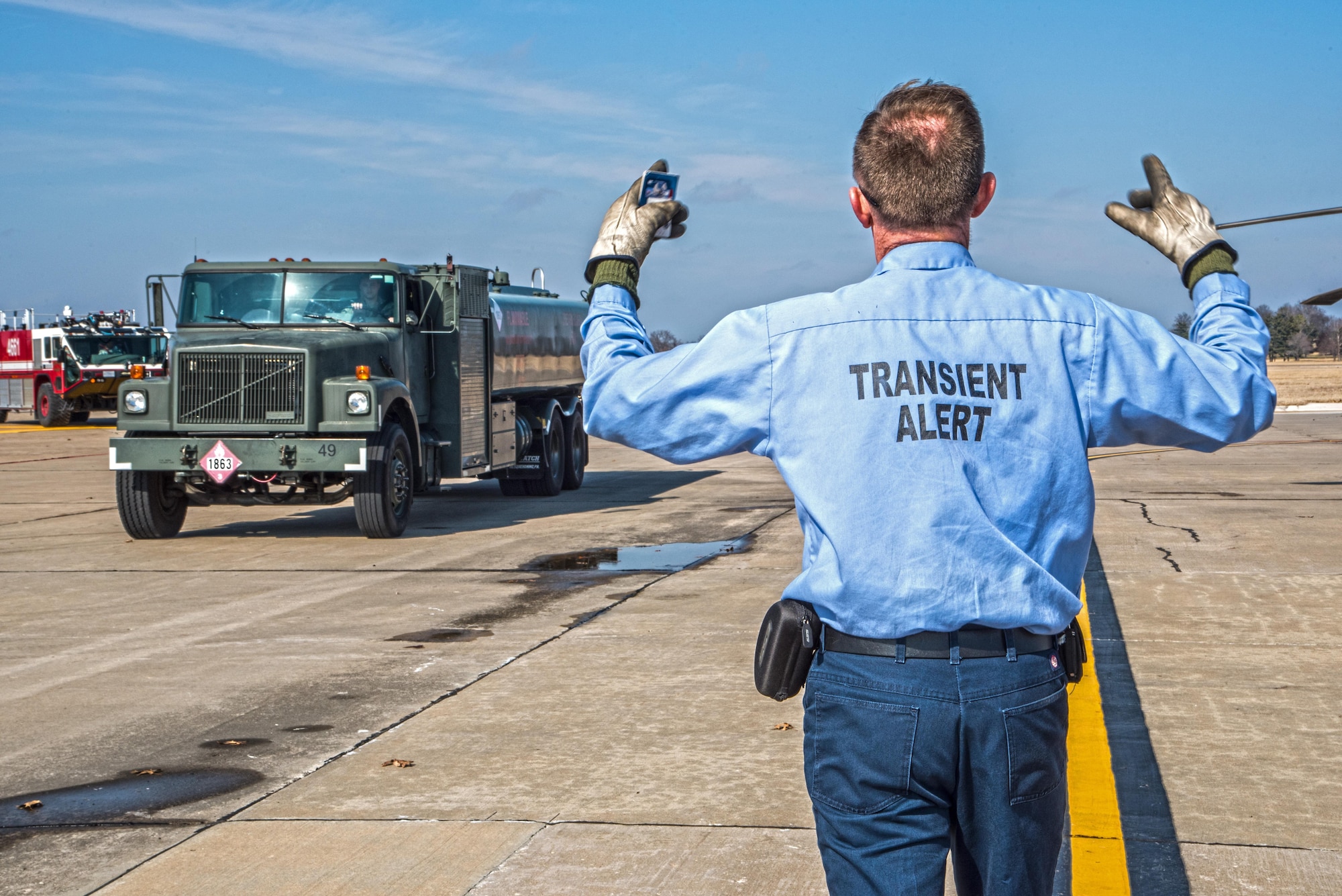 Scott Air Force Base Airmen recently received training for "hot refueling". The training provides aircrews with procedures specific to "hot refueling" operations, with the helicopter running while refueling, versus "cold refueling" where the helicopter is completely shut down prior to receiving fuel. With this two-person operation, one would concentrate on the fueling portion, such as connecting the bonding cable, deploying the fueling hose, and controlling the fueling while the other would remain in eye sight of both the refueler and a flight crew members. Having the choice to "hot refuel" adds to the readiness of the day to day operations and is highly helpful for practice down range when there's not enough time to shut down to refuel. (U.S. Air Force photos/Senior Airman Tristin English)