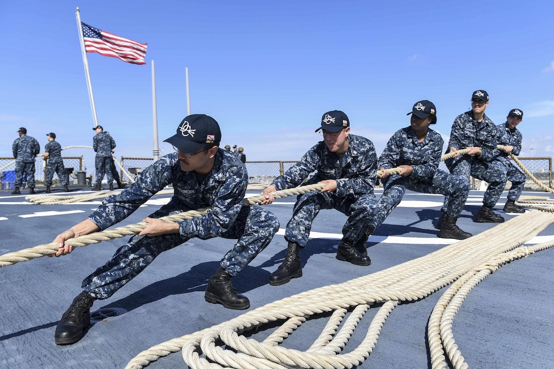 Sailors heave a line as the USS Donald Cook arrives at Naval Station Rota, Spain, Feb. 13, 2017. The guided-missile destroyer is conducting naval operations in the U.S. 6th Fleet area of operations to support U.S. national security interests in Europe and Africa. Navy photo by Petty Officer 3rd Class Alyssa Weeks