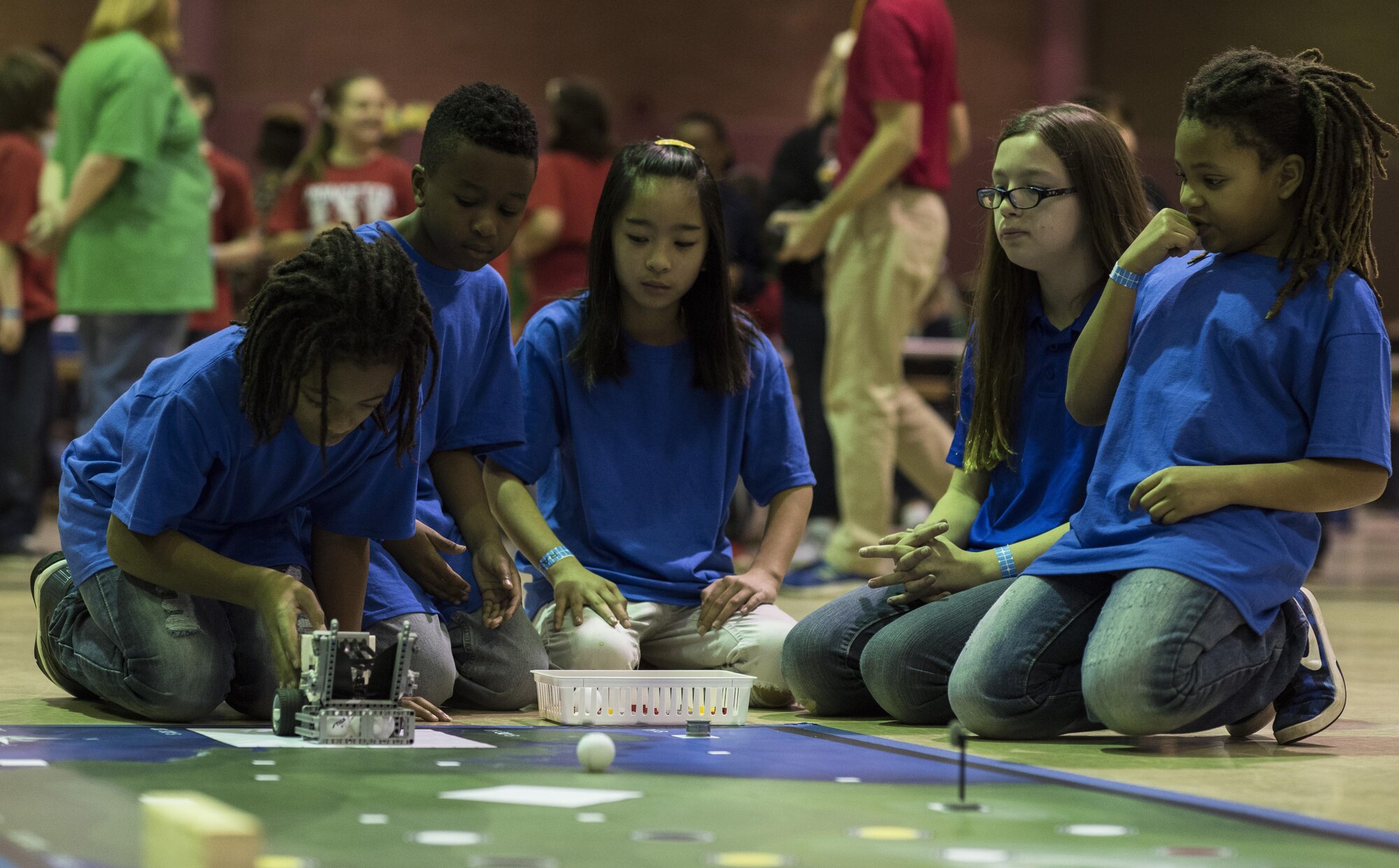Members of the Barksdale Air Force Base Youth Center robotics team prepare their robot to participate in the first round of the Regional Autonomous Robotics Circuit in Bossier City, La., Feb. 11, 2017. The youth center registered both an elementary and middle school team to compete in this year’s event, led by parents of team members. (U.S. Air Force photo/Senior Airman Damon Kasberg)