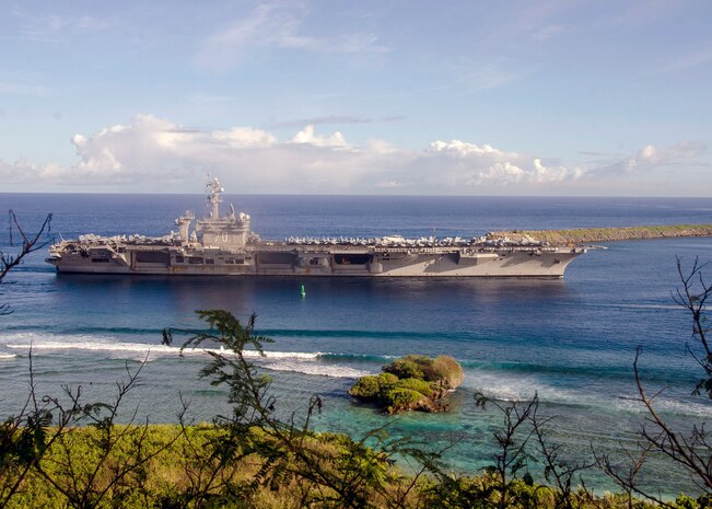 The Nimitz-class aircraft carrier USS Carl Vinson (CVN 70) pulls into Naval Base Guam,  Feb. 10. Vinson is on a regularly scheduled Western Pacific deployment with the Carl Vinson Carrier Strike Group as part of the U.S. Pacific Fleet-led initiative to extend the command and control functions of the U.S. 3rd Fleet in the Indo-Asia-Pacific region. Navy aircraft carrier strike groups have patrolled the Indo-Asia-Pacific regularly and routinely for more than 70 years. 
