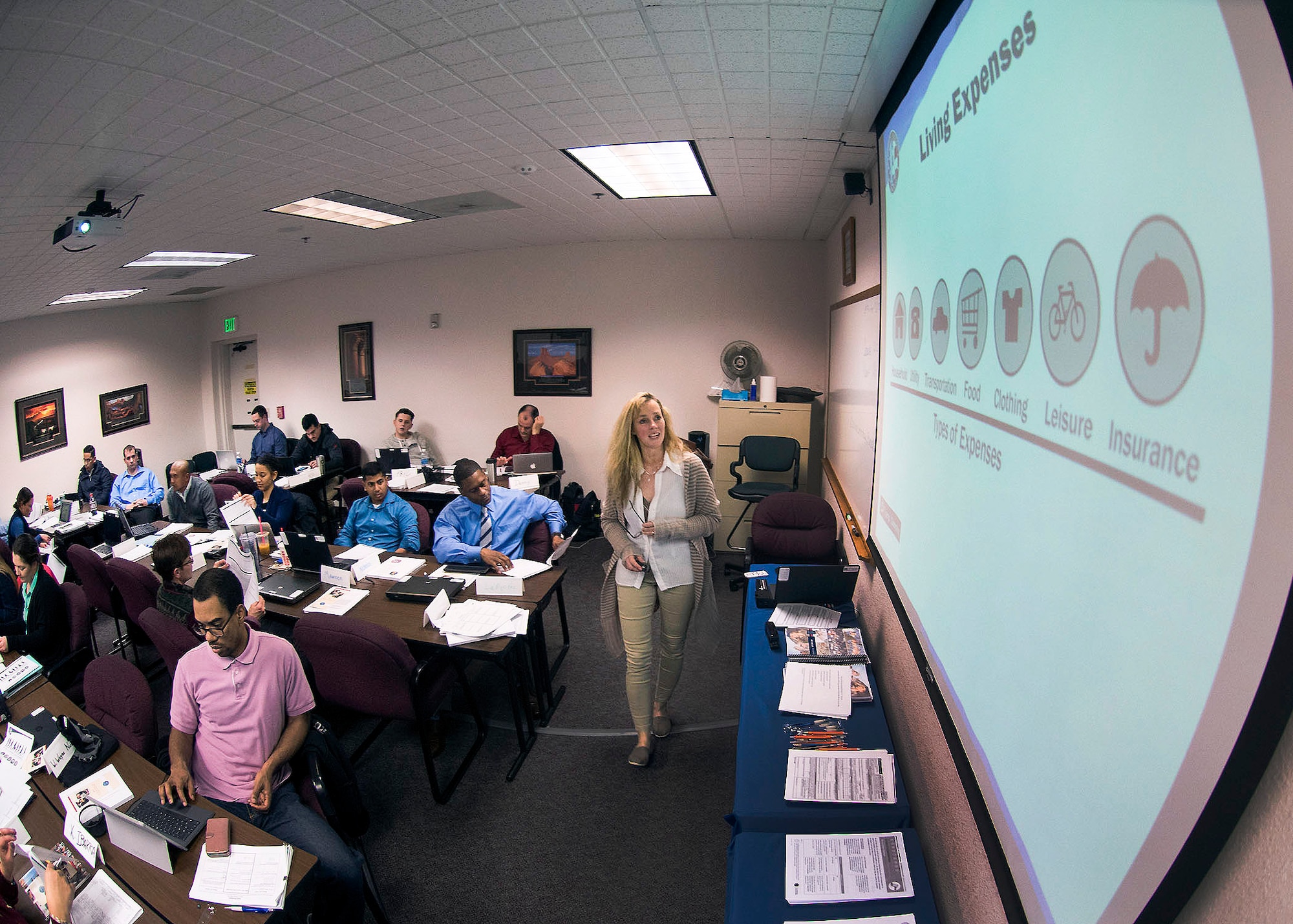 Bonnie Morrow, 60th Force Support Squadron community readiness counselor, teaches a financial management course to service members in  the Transition Assistance Program at Travis Air Force Base, Calif., Feb. 7, 2017. The class is designed to assist military members with the transition from military service to civilian life. (US Air Force  photo/T.C. Perkins Jr.)