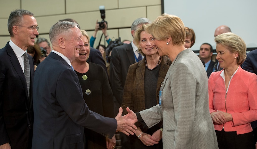 Defense Secretary Jim Mattis greets Italian Defense Minister Roberta Pinotti before a North Atlantic Council meeting at NATO headquarters in Brussels, Feb. 15, 2017. DoD photo by Air Force Tech. Sgt. Brigitte N. Brantley