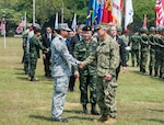 U.S. Pacific Command Commander Adm. Harry Harris shakes hands with Rear Adm. Chanint Phadungkiat, commandant of Amphibious and Combat Support Service Squadron, Royal Thai Fleet during the official opening ceremony of Cobra Gold 2017, Feb. 14, 2017. Cobra Gold, in its 36th iteration, is the largest Theater Security Cooperation exercise in the Indo-Asia-Pacific. This year’s focus is to advance regional security and ensure effective responses to regional crises by bringing together a robust multinational force to address shared goals and security commitments in the Indo-Asia-Pacific region. 