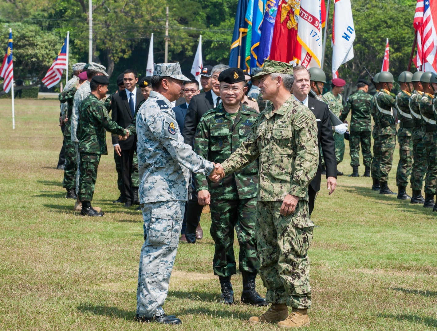 U.S. Pacific Command Commander Adm. Harry Harris shakes hands with Rear Adm. Chanint Phadungkiat, commandant of Amphibious and Combat Support Service Squadron, Royal Thai Fleet during the official opening ceremony of Cobra Gold 2017, Feb. 14, 2017. Cobra Gold, in its 36th iteration, is the largest Theater Security Cooperation exercise in the Indo-Asia-Pacific. This year’s focus is to advance regional security and ensure effective responses to regional crises by bringing together a robust multinational force to address shared goals and security commitments in the Indo-Asia-Pacific region. 