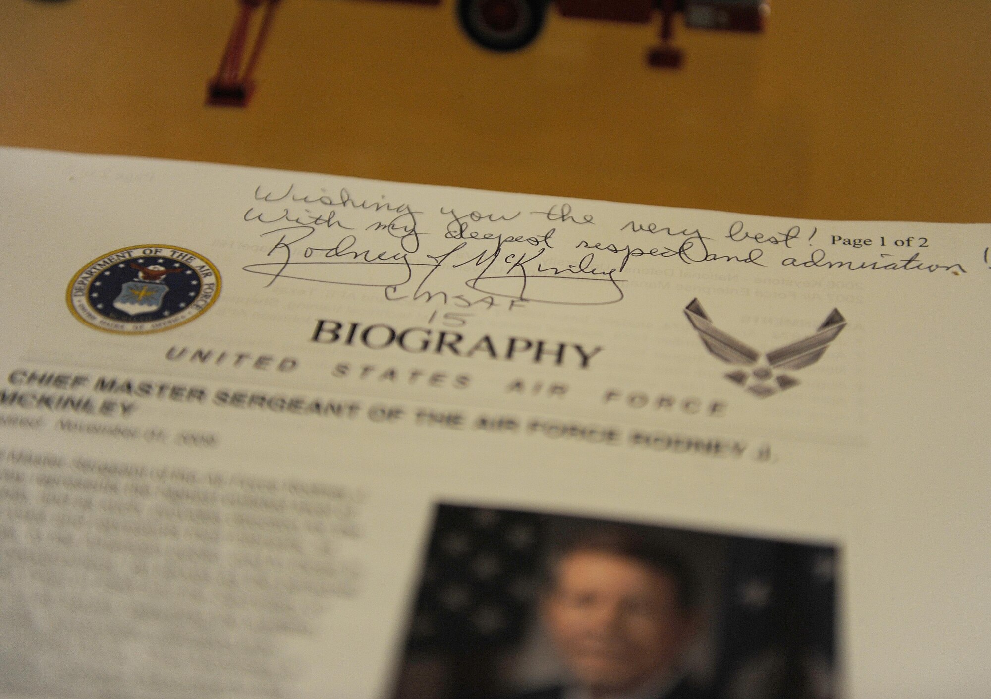 Former Chief Master Sgt. of the Air Force Rodney McKinley signed his biography Feb. 10, 2017, to be displayed in the fire department on Dyess Air Force Base, Texas. During his visit he was given a base tour with stops at the 317th Airlift Group, Armed Forces Reserve Center, 7th Medical Group, the First Term Airmen Center and other Dyess facilities and workstations. (U.S. Air Force photo by Airman 1st Class Emily Copeland)