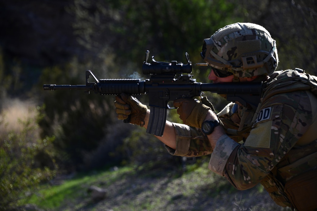 Staff Sgt. Ryan Roseler, 56th Civil Engineer Squadron explosive ordnance disposal team member, fires down range toward a target during the live-fire shooting exercise Feb. 7, 2017, at the Barry M. Goldwater Range in Gila Bend, Az. The purpose of live-fire training is to ensure Airmen are combat ready when deployed to hostile locations. (U.S. Air Force photo by Airman 1st Class Alexander Cook)  