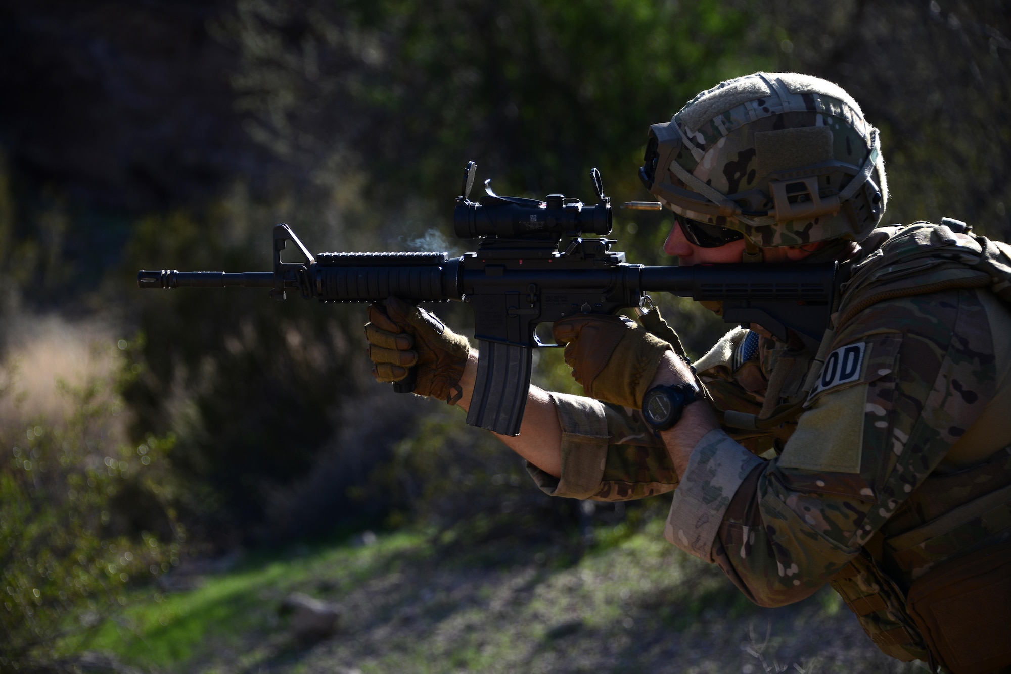 Staff Sgt. Ryan Roseler, 56th Civil Engineer Squadron explosive ordnance disposal team member, fires down range toward a target during the live-fire shooting exercise Feb. 7, 2017, at the Barry M. Goldwater Range in Gila Bend, Az. The purpose of live-fire training is to ensure Airmen are combat ready when deployed to hostile locations. (U.S. Air Force photo by Airman 1st Class Alexander Cook)  