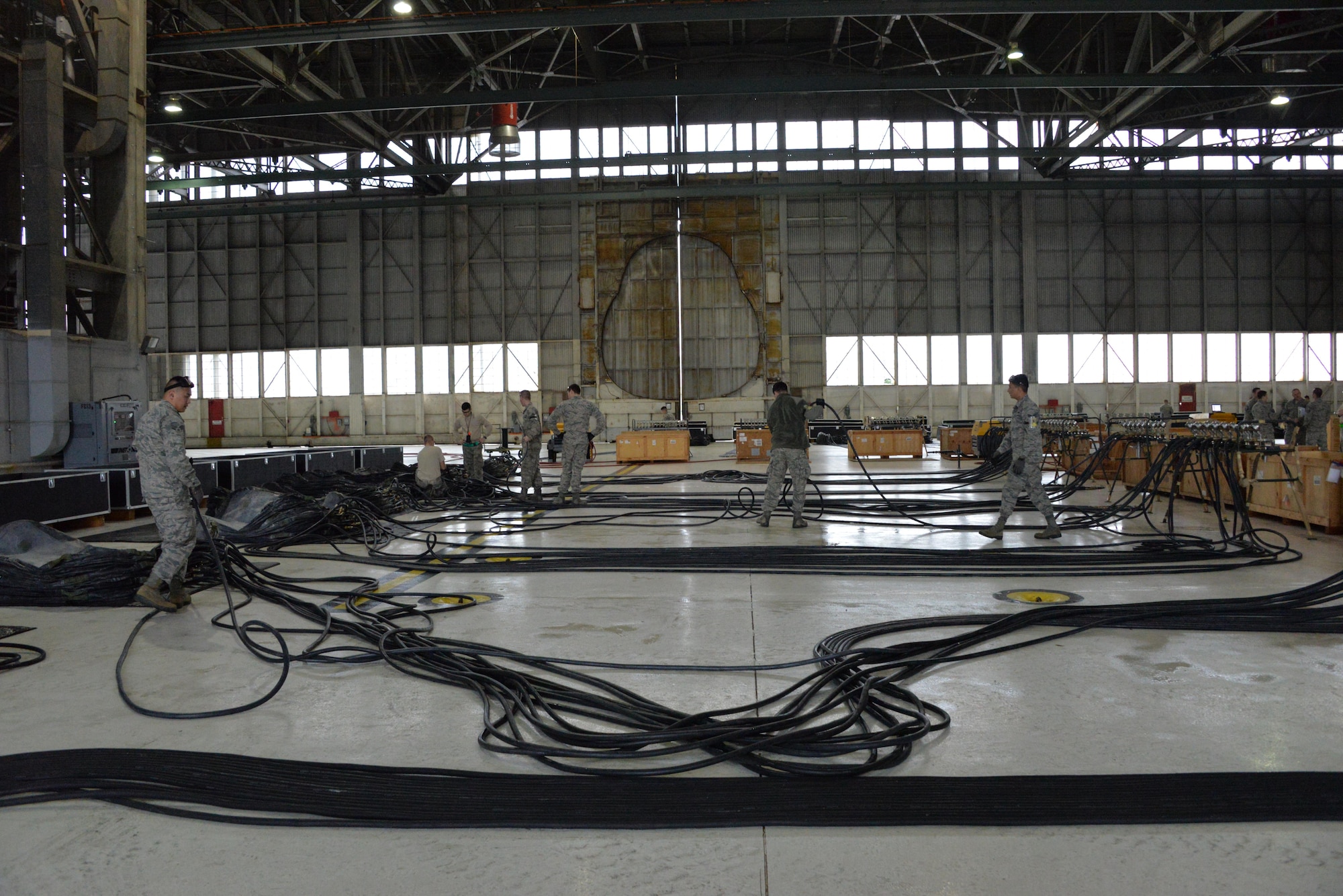 The 60th Maintenance Squadron sets up for the annual quality assurance inspection of the crash, damaged or disabled aircraft recovery program Feb. 9, 2017 at Travis Air Force Base, Calif. The lifting bags, capable of supporting up to 52,000 pounds individually, are used to lift a downed aircraft so it can be salvaged, repaired and recovered.  (U.S. Air Force photo by Senior Airman Amber Carter)