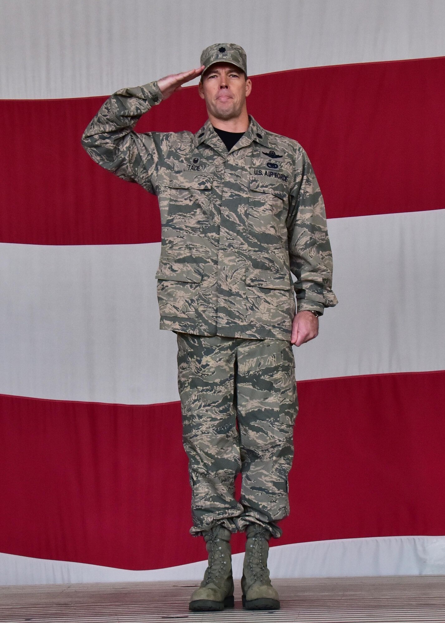 Lt. Col. Gavin D. Tade, 944th Mission Support Group commander, assumes command and salutes the Airmen of the 944th Mission Support Group Feb. 12 during a change-of-command ceremony at Luke Air Force Base, Ariz. (U.S. Air Force photo by Tech. Sgt. Louis Vega Jr.)