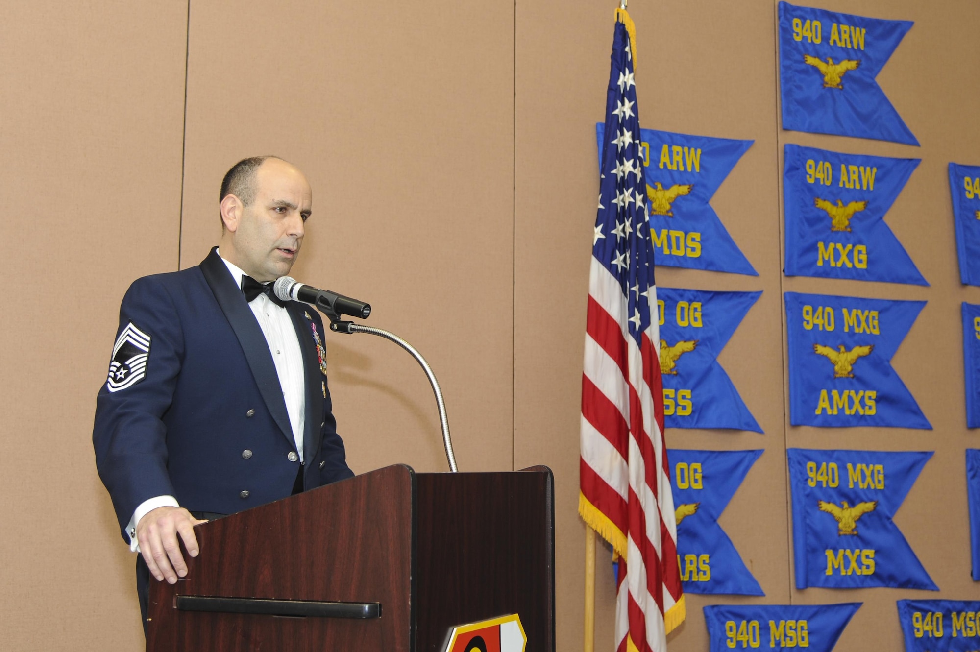 Guest speaker Chief Master Sgt. Matthew Proietti, Air Force Reserve’s Yellow Ribbon Reintegration Program Public Affairs Manager, speaks at the Outstanding Airmen of the Year banquet Feb. 11, 2017, at Beale Air Force Base, California. Proietti spoke about the ambition, persevere and challenges that must be overcome to be named an outstanding Airman. (U.S. Air Force by Senior Airman Tara R. Abrahams)