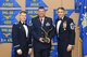 Tech. Sgt. Erik Calderon, 940th Aircraft Maintenance Squadron dedicated crew chief, accepts the NCO of the Year award, presented by Col. Craig C. Peters, 940th Air Refueling Wing commander, and Chief Master Sgt. Carmen Madia, 940 ARW command chief Feb. 11, 2017 at Beale Air Force Base, California. The Outstanding Airmen of the Year were presented with their awards during the wing’s OAY banquet. (U.S. Air Force by Senior Airman Tara R. Abrahams)