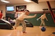Senior Master Sgt. Joe Amorim, 940th Force Support Squadron Superintendent, strikes a bowling pose as he throws the ball on Feb. 10, 2017 at Beale Air Force Base, Calif. Amorim along with fellow members of his unit competed in the 940th Air Refueling Wing’s first of hoping to be several lunch-hour bowling tournament, hosted by first sergeants on Saturday during a unit training assembly. (U.S. Air Force by Staff Sgt. Brenda Davis/Released)