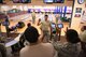 Airman John Mendiola, 940th Logistics Readiness Squadron material management, high-fives fellow teammates at the 940th Air Refueling Wing’s first lunch-hour bowling tournament hosted by first sergeants on Feb. 10, 2017 at Beale Air Force Base, Calif. Members of the wing from various units gathered at the tournament to build camaraderie and boost morale during the unit training assembly. (U.S. Air Force by Staff Sgt. Brenda Davis/Released)