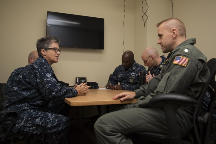 U.S. Navy Pacific Fleet Command Master Chief Susan Whitman, left, and U.S. Navy Cmdr. Shane Tanner, right, executive officer for Carrier Airborne Early Warning Squadron (VAW) 125, speak during a visit to the facilities, Sailors and Marines at Marine Corps Air Station Iwakuni, Japan, Feb. 14, 2017. Whitman spoke about destructive behaviors such as sexual assault, drug abuse and alcohol abuse and how it affects warfighting readiness. (U.S. Marine Corps photo by Lance Cpl. Joseph Abrego)