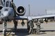 Airmen assigned to the 25th Aircraft Maintenance Unit perform pre-flight checks on an A-10 Thunderbolt II assigned to the 25th Fighter Squadron during Buddy Wing 17-3 at Osan Air Base, Republic of Korea, Feb. 14, 2017. During Buddy Wing 17-3, pilots from the 25th FS and the ROK air force 237th Tactical Control Squadron flew training missions to increase to the two units’ ability to work together in a wartime scenario. (U.S. Air Force photo by Staff Sgt. Victor J. Caputo)
