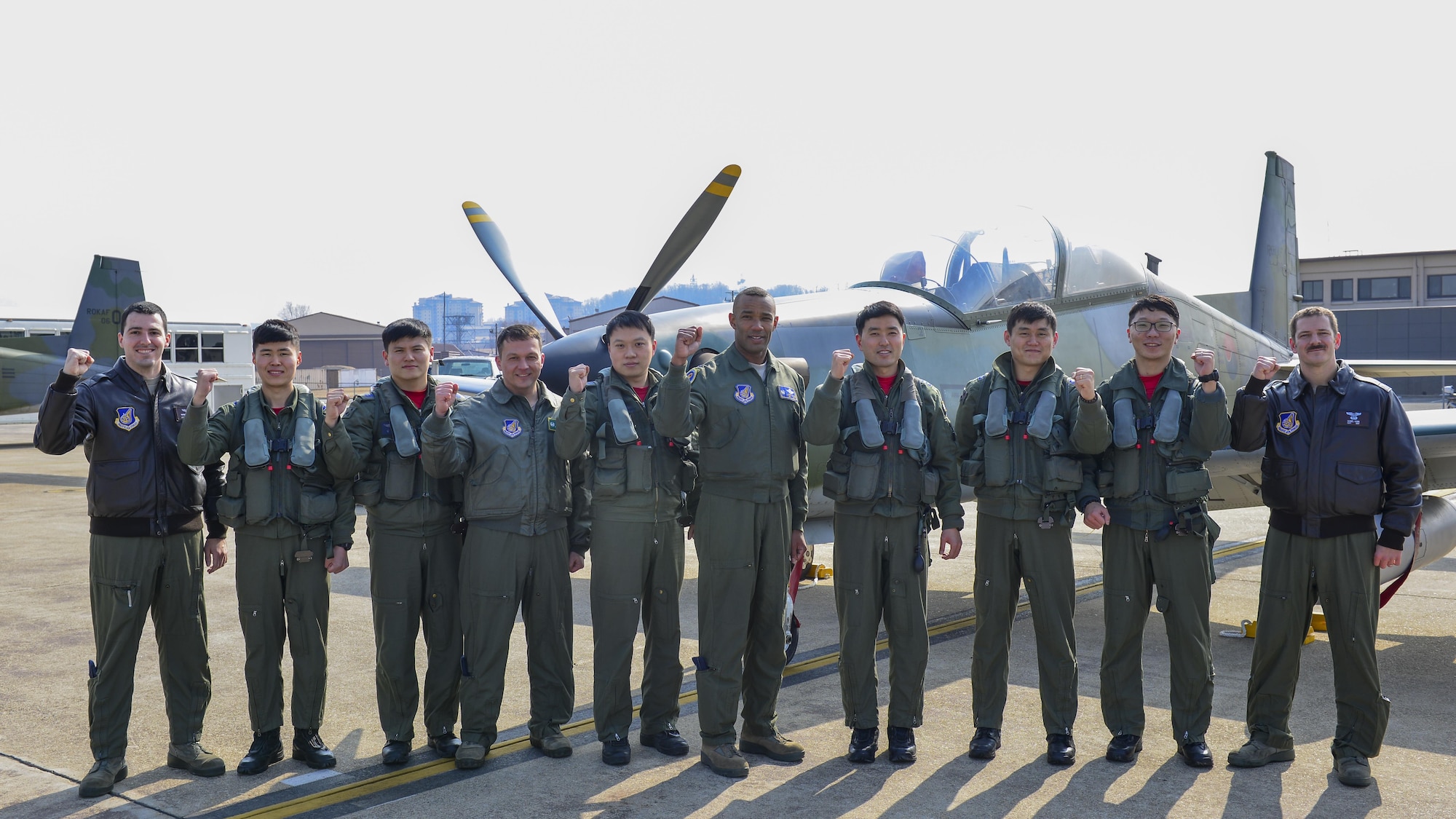 U.S. Air Force Col. Larry Card, center, 51st Operations Group commander, poses with pilots from the 25th Fighter Squadron and the Republic of Korea air force 237th Tactical Control Squadron during Buddy Wing 17-3 at Osan Air Base, ROK, Feb. 13, 2017. Buddy Wing exercises are held throughout the year at different air bases across the ROK, bringing together different elements of U.S. and ROK air force assets for bi-lateral training and the exchange of skills. (U.S. Air Force photo by Staff Sgt. Victor J. Caputo)