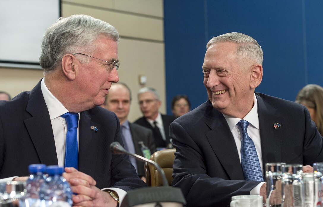 Defense Secretary Jim Mattis talks with British Defense Secretary Michael Fallon during a North Atlantic Council meeting at NATO headquarters in Brussels, Feb. 15, 2017. DoD photo by Air Force Tech. Sgt. Brigitte N. Brantley