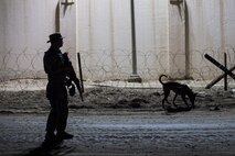 U.S. Air Force Staff Sgt. Dakoda, 380th Expeditionary Security Forces Squadron dog handler, completes a detection training exercise at an undisclosed location in Southwest Asia, Feb. 9, 2017. The 380 ESFS regularly trains with various Coalition and joint service units. During this exercise members of the 380th Explosive Ordnance Disposal collaborated with military working dog units from the 380 ESFS and CTG 56.7. (U.S. Air Force photo/Senior Airman Tyler Woodward)