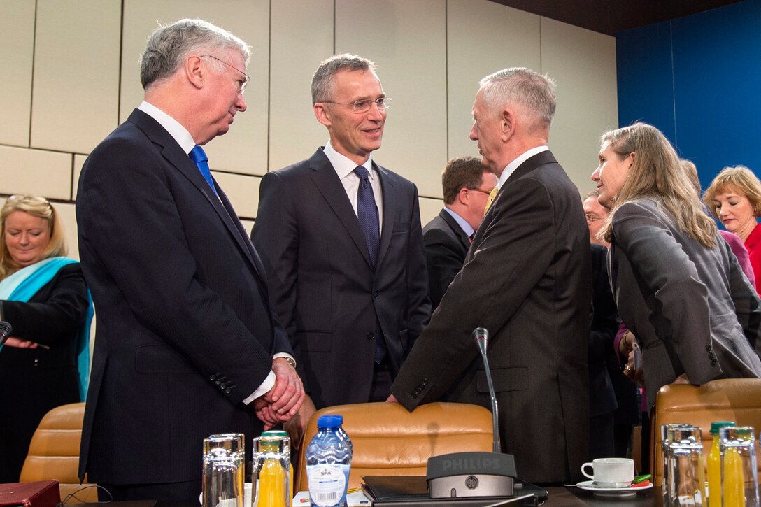 Defense Secretary Jim Mattis, right, talks with British Defense Secretary Michael Fallon, left, and NATO Secretary General Jens Stoltenberg, center, before a North Atlantic Council meeting at NATO headquarters in Brussels, Feb. 16, 2017. DoD photo by Air Force Tech. Sgt. Brigitte N. Brantley