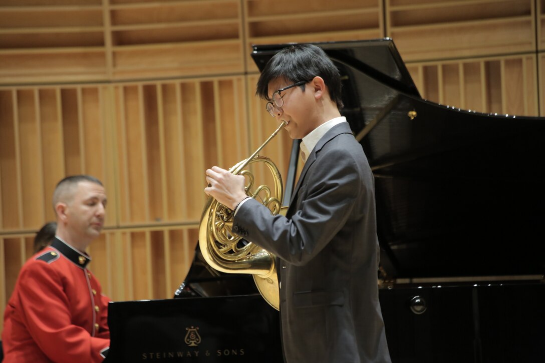 On Feb. 11, 2017, eight high school musicians competed for a $2,500 scholarship from the Marine Corps Heritage Foundation and the chance to solo with the Marine Band. French horn player Shawn Zheng won first place and trumpet player Forrest Johnston was named runner up and received a $500 scholarship from the Marine Corps Heritage Foundation. (U.S. Marine Corps photo by Master Sgt. Kristin duBois/released) 