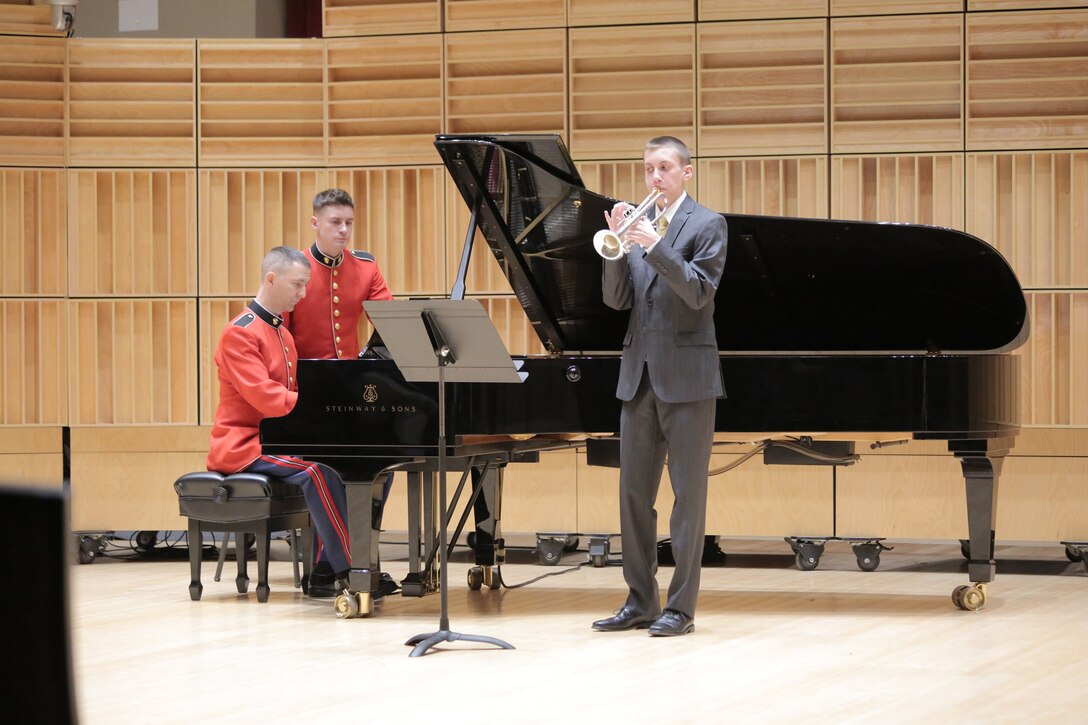 On Feb. 11, 2017, eight high school musicians competed for a $2,500 scholarship from the Marine Corps Heritage Foundation and the chance to solo with the Marine Band. French horn player Shawn Zheng won first place and trumpet player Forrest Johnston was named runner up and received a $500 scholarship from the Marine Corps Heritage Foundation. (U.S. Marine Corps photo by Master Sgt. Kristin duBois/released)