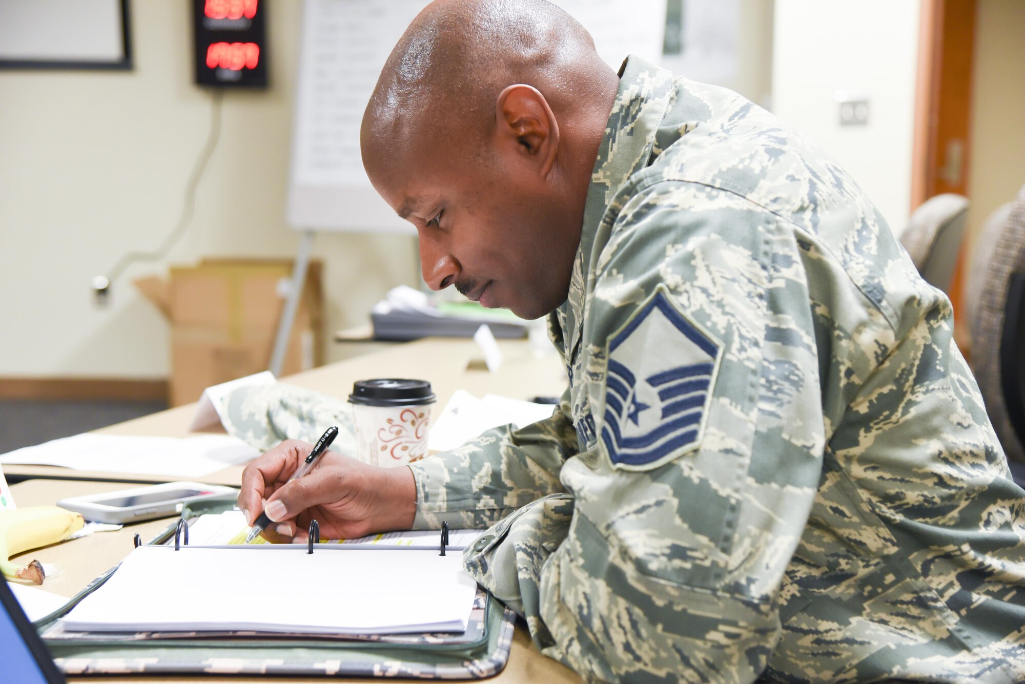 Master Sgt. Dionni Henderson, 403rd Aeromedical Staging Squadron, reviews class material during a senior leader course that was held Feb. 13-15 at Keesler Air Force Base, Mississippi. The course focused on leadership and continuous process improvement. (U.S. Air Force photo/Maj. Marnee A.C. Losurdo)