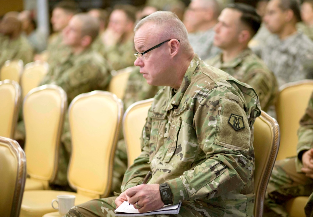 VOGELWEH, Germany – Lt. Col. Timothy S. Sumovich, 7th Mission Support Command deputy director of logistics, takes notes during the 7th Mission Support Command Panel Forum Feb. 10-11 at the Armstrong Club. This year, the U.S. Army Reserve in Europe celebrates more than 60 years of operations by looking at the past, present and future. Discussion topics included USAR participation in past operations from post-WWII era all the way up to the ongoing operation Atlantic Resolve in the Baltic States. Brig. Gen. Steven Ainsworth, 7th MSC commanding general, hosted the event.

(Photo by Sgt. 1st Class Matthew Chlosta, 7th Mission Support Command Public Affairs Office)