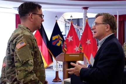 Retired Maj. Gen. Paul Patrick, right, a former commander of the 7th Army Reserve Command from 1998-2002, speaks to Staff Sgt. Wesley Ricketts during the 7th Mission Support Command Panel Forum Feb. 10 at the Armstrong Club. This year, the U.S. Army Reserve in Europe celebrates more than 60 years of operations by looking at the past, present and future. Discussion topics included USAR participation in past operations from post-WWII era all the way up to the ongoing operation Atlantic Resolve in the Baltic States. Brig. Gen. Steven Ainsworth, the 7th MSC commanding general, hosted the event.

(Photo by Capt. Kaitlyn Heacock, 7th Mission Support Command Public Affairs Office)