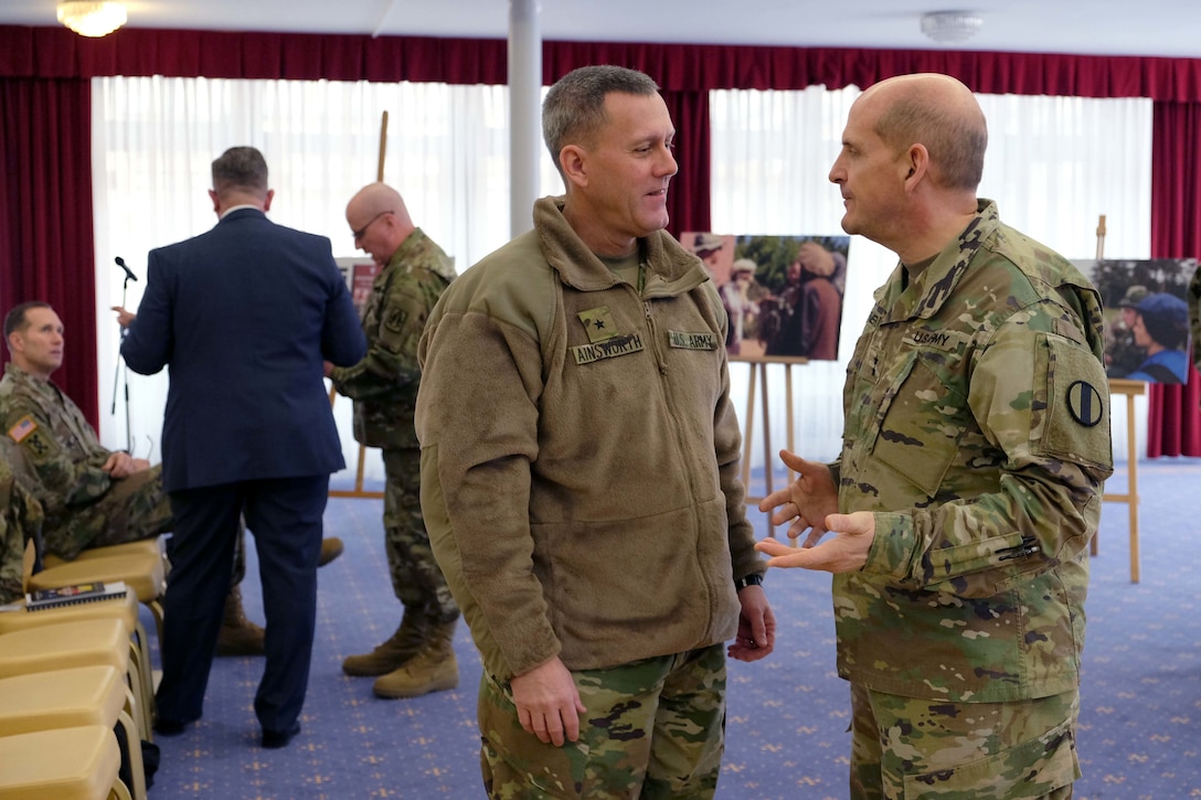 Brig. Gen. Steven W. Ainsworth, commanding general of the 7th Mission Support Command, left, speaks to Maj. Gen. Paul Benenati, right, one of the unit’s former commanding generals, during the 7th MSC Panel Forum Feb. 10 at the Armstrong Club. This year, the U.S. Army Reserve in Europe celebrates more than 60 years of operations by looking at the past, present and future. Discussion topics included USAR participation in past operations from post-WWII era all the way up to the ongoing operation Atlantic Resolve in the Baltic States.