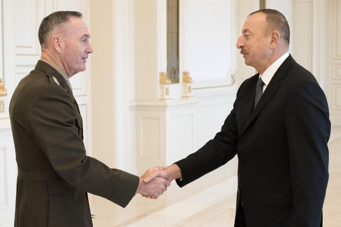 Marine Corps Gen. Joe Dunford, chairman of the Joint Chiefs of Staff, shakes hands with Azerbaijan President Ilham Aliyev before the two meet to discuss matters of mutual importance in Baku, Azerbaijan, Feb. 16, 2017. DoD photo by Navy Petty Officer 2nd Class Dominique A. Pineiro