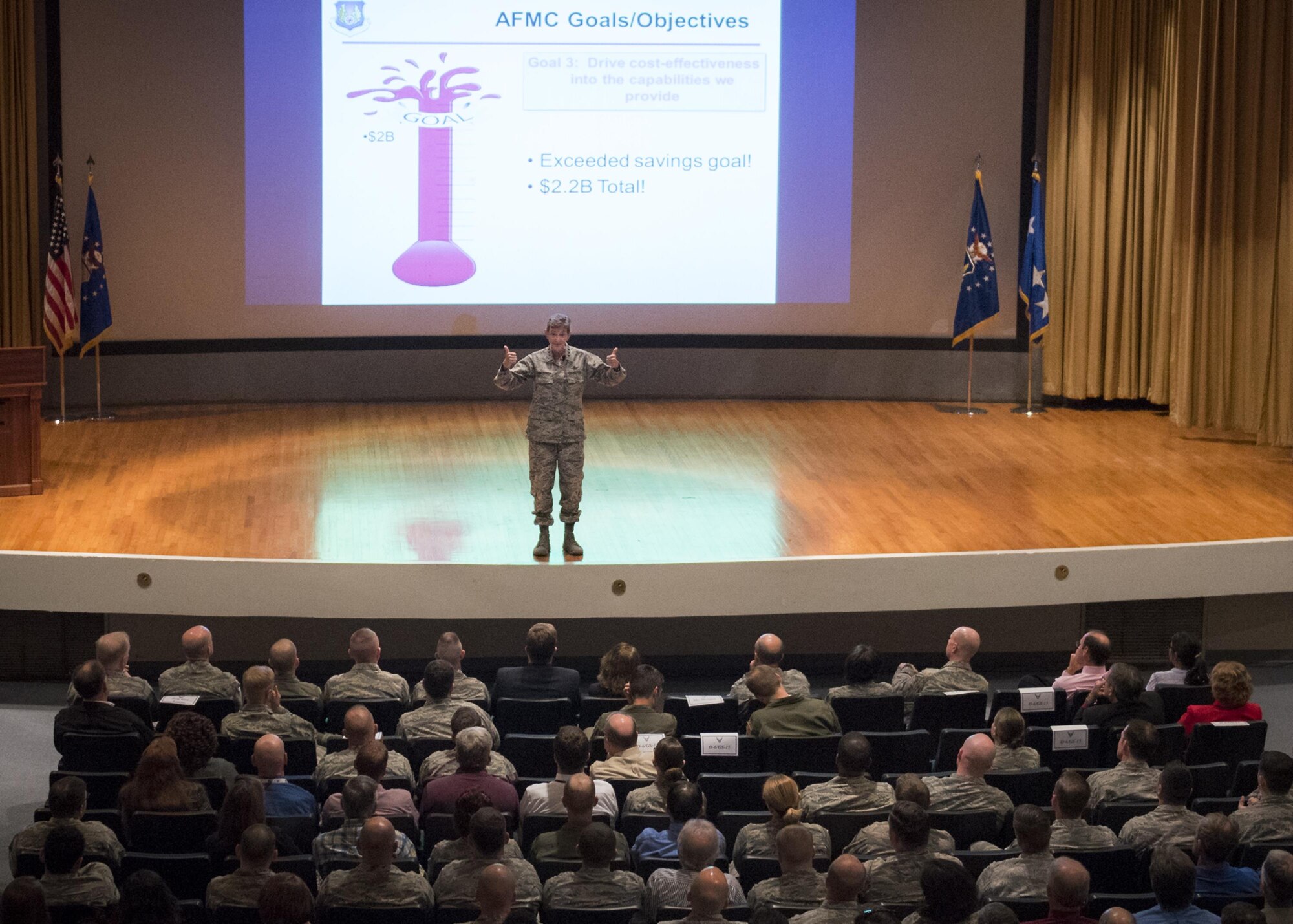 Gen. Ellen M. Pawlikowski, the Air Force Materiel Command commander, gives two thumbs up for the recent base successes at her Commander’s Call Feb. 14 at Eglin Air Force Base, Fla.  The general spent two days at the base receiving updates on the various programs occurring in her various AFMC units.  (U.S. Air Force photo/Samuel King Jr.)