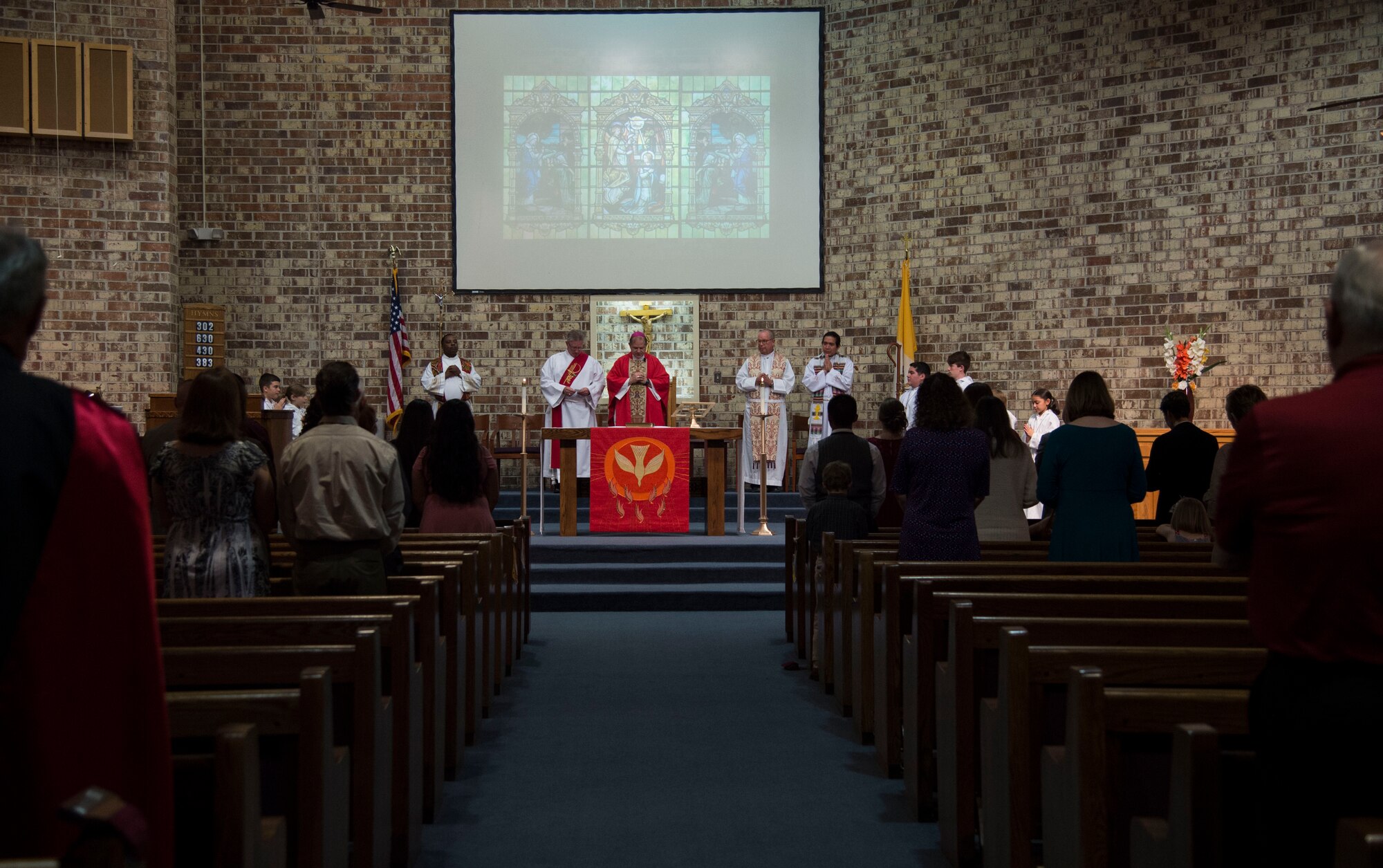 Bishop Robert Coyle, Archdiocese for the Military Service, addresses the congregation during the Confirmation Mass, Feb. 14, 2017, at Moody Air Force Base, Ga. Pope John Paul II created the Archdiocese for the Military Services in 1985 to provide the Catholic Church's full range of pastoral ministries and spiritual services to those in the United States Armed Forces. The Archbishop for the Military Services is responsible for the spiritual welfare of more than 1.8 million men, women and children. (U.S. Air Force photo by Andrea Jenkins)