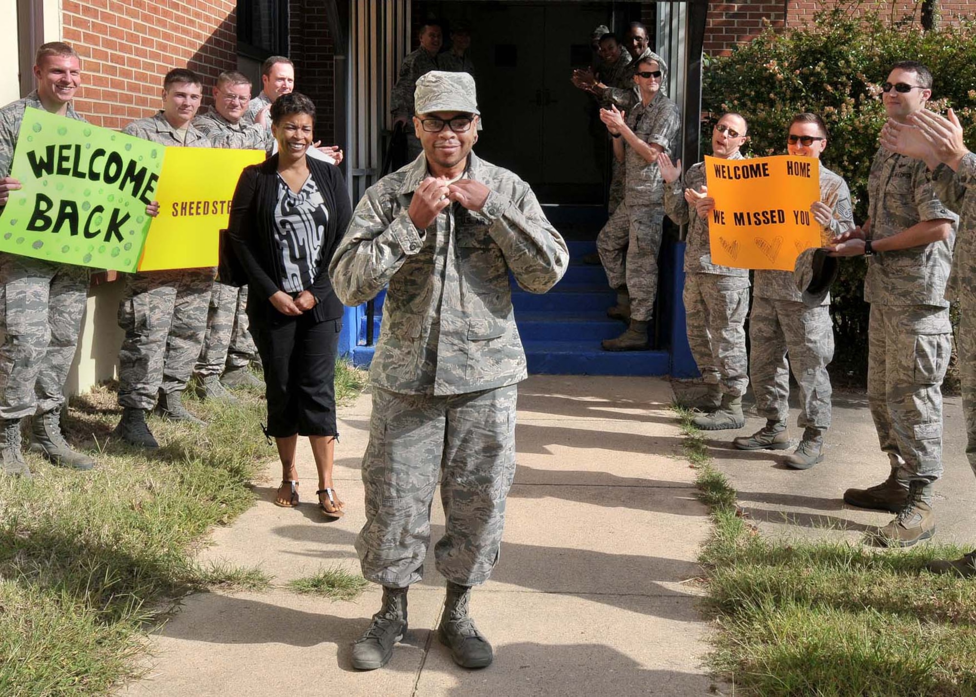 Staff Sgt. Rasheed, 7th Intelligence Squadron, is greeted by Airmen from the 7th IS during a welcome back celebration Sep. 16, 2016, at Fort George G. Meade, Maryland. Rasheed suffered a cerebral aneurysm in 2015 and is currently working to return to his career field as an intelligence analyst. (U.S. Air Force photo/Tech. Sgt. Veronica Pierce)