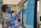 Staff Sgt. Rasheed, 7th Intelligence Squadron, selects a letter corresponding to a word spoken from a touch screen interactive program which tests his cognitive reaction time during occupational therapy Jan. 17. Rasheed suffered a cerebral aneurysm in 2015 and part of his recovery is working on occupational exercises. (U.S. Air Force photo/Staff Sgt. Alexandre Montes)